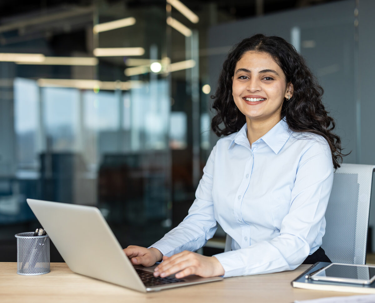 Small business owner reviewing results on a laptop